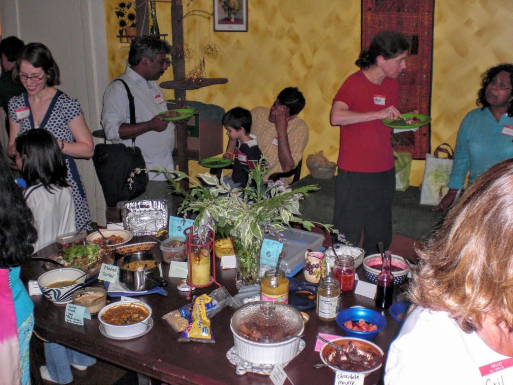 wafflers congregate around vegan waffle toppings