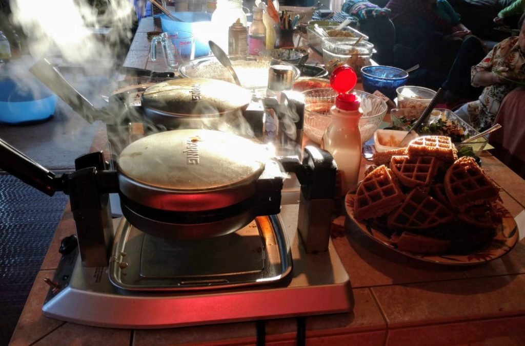 steaming waffle makers at a waffle party